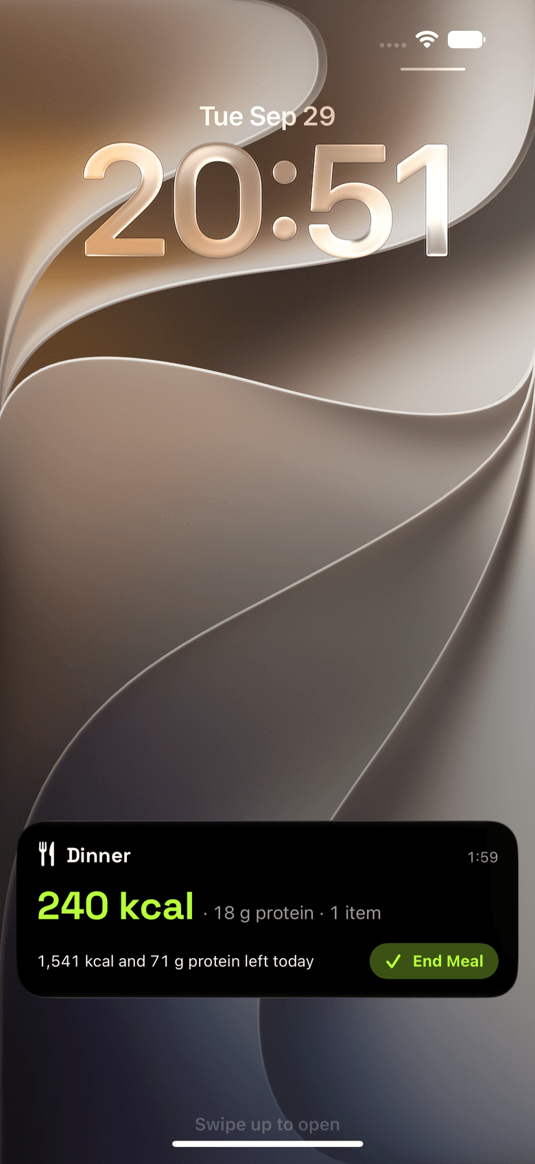 Live Activity on the Lock Screen with the meal's calories, protein and an End Meal button